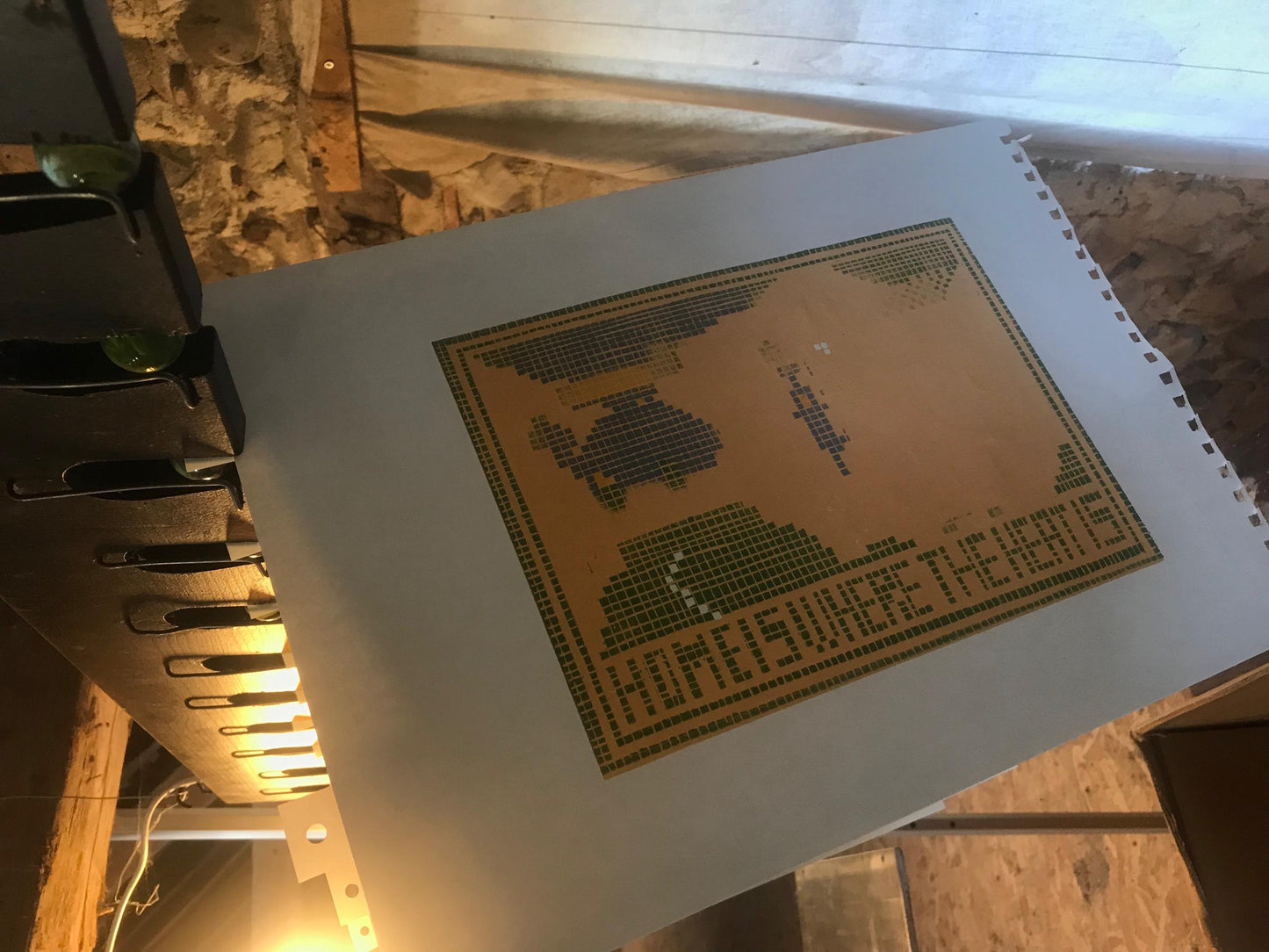 For The Devil's Birthday His Grandma Made Him A Needlepoint Picture Depicting His Favourite Pastime.